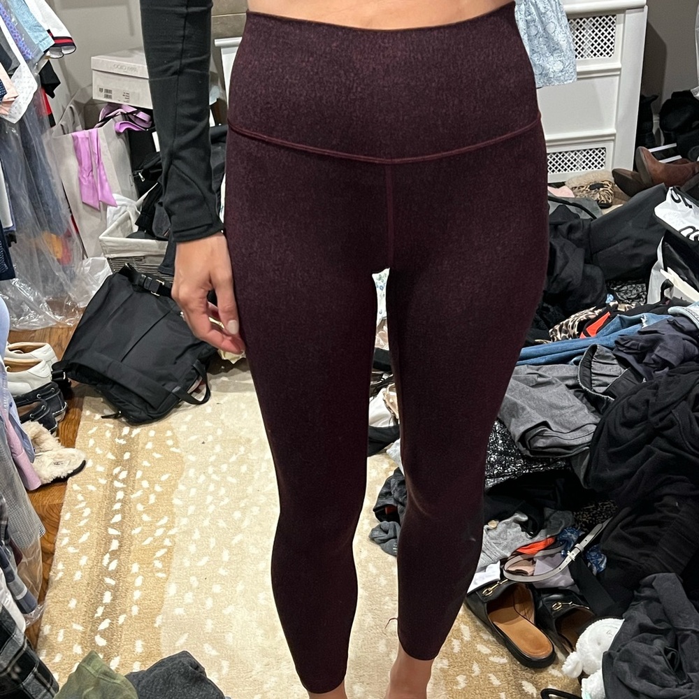 Lululemon leggings with detail on one leg.